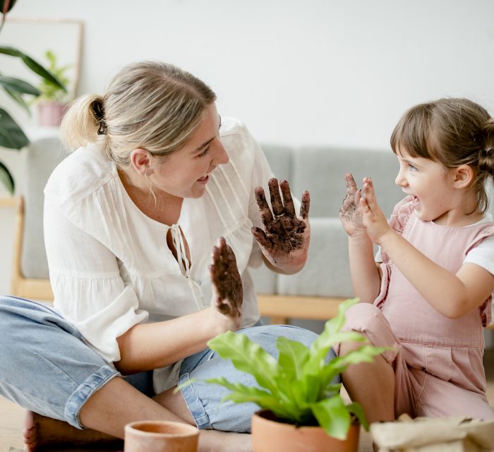 Kid DIY plant potting with mom at home Kid DIY plant potting with mom at home